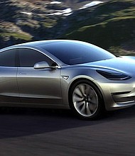 	Tesla Model 3.