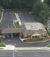 Police are on the scene of a standoff and hostage situation at the Wells Fargo location at 2675 Windy Hill Road in Marietta.