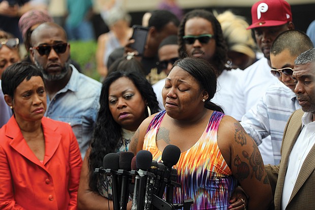 Allysza Castile, sister of Minnesota shooting victim Philando Castile, weeps as she addresses the crowd outside the Ramsey County Courthouse in St. Paul, Minn., on June 16, after police officer Jeronimo Yanez was acquitted of criminal charges in her brother’s death. 