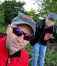 Ken Ballard, left, with his son, has shared a heartfelt plea for LGBT rights.