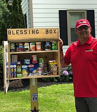 Roman Espinoza - The concept is simple. The box is a miniature food pantry -- receiving items from those who want to donate, and offering it to those who need them.