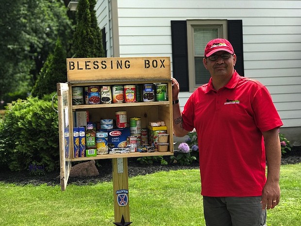 Roman Espinoza - The concept is simple. The box is a miniature food pantry -- receiving items from those who want to donate, and offering it to those who need them.