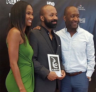 L to R. Nicole Friday, Devin Haqq, and Jeff Friday, Founder and CEO of American Black Film Festival Ventures.