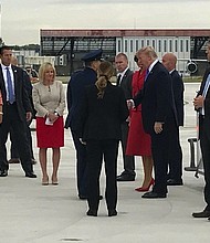 	President Trump arrives at Charles de Gaulle airport.
