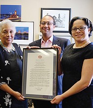 State Sen. Jennifer L. McClellan, right, presents Free Press Publisher Jean Patterson Boone with a resolution honoring the award-winning newspaper on its 25th anniversary of serving and informing people in the Greater Richmond community. The presentation, also attended by Raymond H. Boone Jr., Free Press vice president of new business development, was held Tuesday in Sen. McClellan’s office in the Pocahontas Building on Capitol Square. The resolution was co-sponsored by the Richmond and Henrico delegations, Sen. McClellan noted, and was passed by the General Assembly earlier this year. The resolution commended the publication on its commitment to “free expression and robust debate” and its work to “facilitate openness and accountability in local and state government,” along with its efforts to address complex issues facing the people in the Richmond area.
