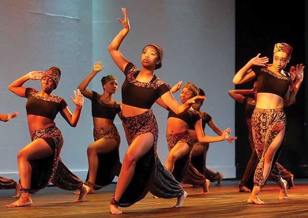 The art of dance //
Members of the City Dance Theatre take to the stage at Dogwood Dell last Friday to perform as part of the 2017 Festival of Arts. The troupe, under the direction of Annette Holt and Rodney Williams, has a repertoire that ranges from classical ballet and dramatic reflections of African-American history to contemporary jazz and modern dance. Its 18 members range in age from 9 to 18. 