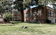 Cityscape // In this view from Hull Street Road, the old Elkhardt Middle School still looks sturdy and sound, despite being closed. However, the rear of the building tells the real story — that demolition of the building is underway. Built around 1940 for Chesterfield County, Elkhardt became part of the Richmond public school system in 1970 as the result of the city’s annexation of a portion of Chesterfield. In 2015, the building was closed and students were moved after an air quality study found high levels of mold and other problems. 
