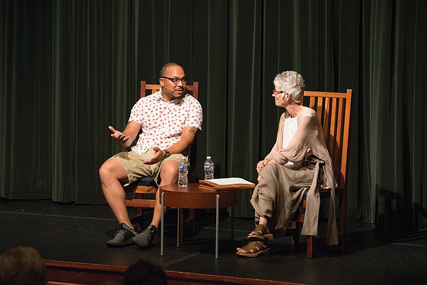 Photo courtesy of Odd Moxie //
Chef Jerome Grant, executive chef of Sweet Home Café in the National Museum of African-American History and Culture in Washington, talks about his culinary background and his work at the museum restaurant with Fredrika Teute of the Williamsburg Farmers Market during a presentation July 7 at the Williamsburg Regional Library. 
