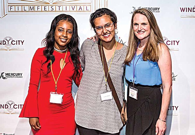 Franhsay Lopez (left) poses with her DePaul film mentor Serena Hodges (center) and Program Director Liliane Calfee (right), at the screening of their documentary film entitled “Rise Up,” which was displayed at the Windy City International Film Festival inside Mercury Theatre (3745 N. Southport Ave). Photo Credit: Chicago Housing Authority (CHA