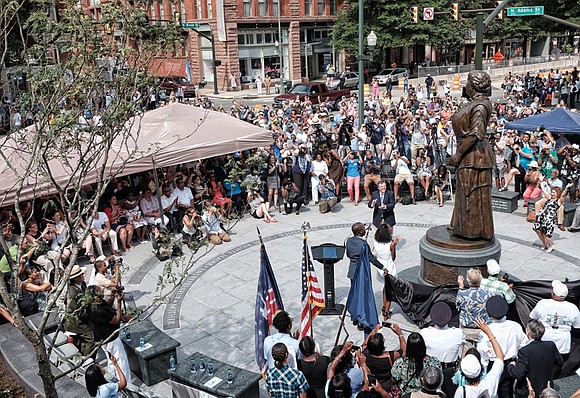 Richmond residents and officials rejoiced Saturday morning as the long-awaited statue of hometown hero Maggie Lena Walker was unveiled.