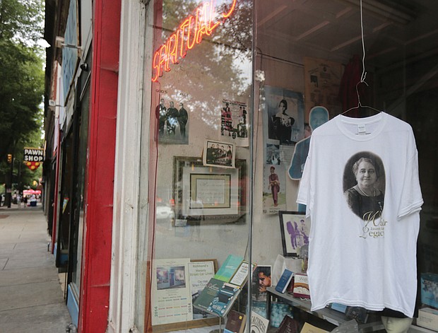 7. A special T-shirt marking the day hangs in the window at Barky’s Spiritual Store at 18 E. Broad St.