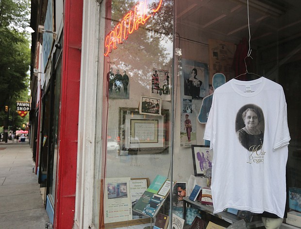 7. A special T-shirt marking the day hangs in the window at Barky’s Spiritual Store at 18 E. Broad St.