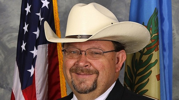 Jerry Niles, sheriff of Garfield County, Oklahoma, was charged in the death of a prisoner.