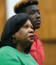 Honored for public service //
State Sen. Rosalyn R. Dance of Petersburg, who represents parts of Richmond and four other localities in the General Assembly, is recognized by the Richmond City Council on Monday night for nearly 25 years of public service. As an elected official, she previously served in the House of Delegates and on Petersburg City Council for 12 years, including several terms as Petersburg mayor from 1992 to 2004. With her is her 16-year-old grandson, Jarratt R. Dance-Kelly, who is visiting from La Verne, Calif.