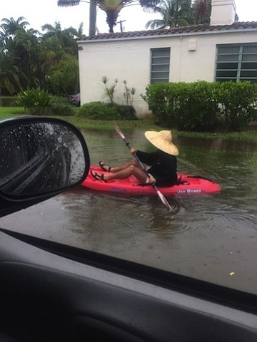 The remnants of Tropical Depression Emily prompted some Miami residents to take to the flooded streets in kayaks.