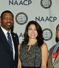 Derrick Johnson, interim president and CEO of the NAACP, Belinda Johnson, Airbnb's chief business affairs officer and Leon Russell, chair of the NAACP Board. NAACP