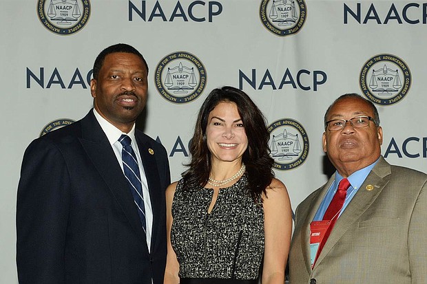 Derrick Johnson, interim president and CEO of the NAACP, Belinda Johnson, Airbnb's chief business affairs officer and Leon Russell, chair of the NAACP Board. NAACP