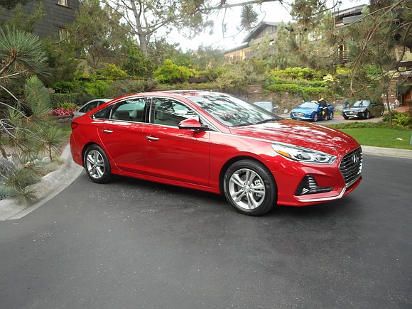 There was a 2018 Hyundai Sonata on display in front of the hotel here. We could tell it was a …