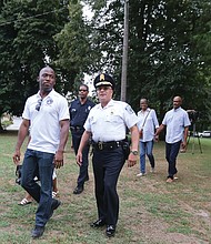 National Night Out //  Richmond Police Chief Alfred Durham, right, and Mayor Levar M. Stoney arrive at Pollard Park in North Side on Tuesday evening for National Night Out, the effort to unify law enforcement and residents in communities across the nation. 