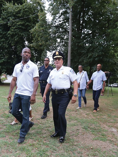 National Night Out //  Richmond Police Chief Alfred Durham, right, and Mayor Levar M. Stoney arrive at Pollard Park in North Side on Tuesday evening for National Night Out, the effort to unify law enforcement and residents in communities across the nation. 