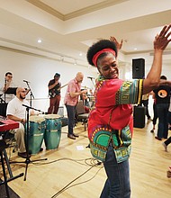 The RVA Latino experience//Judy Lynn Edwards and Kevin LaMarr Jones of Richmond take the floor and party to the beat during the day’s festivities. 
