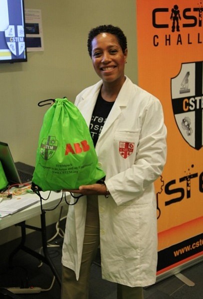 Dr. Reagan Flowers holding up one of the bags given to the kids
who participated in the “C-STEM Summer Pop-Up Maker Space Camp.” (Photo: The Health Museum)
