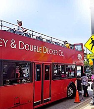 Carlos Nelson, who is the executive director for Greater Auburn-Gresham Development Corporation hosted the Auburn Gresham Housing Trolley Tour on Aug. 5, 2017. Photo Credit: Christopher Shuttlesworth