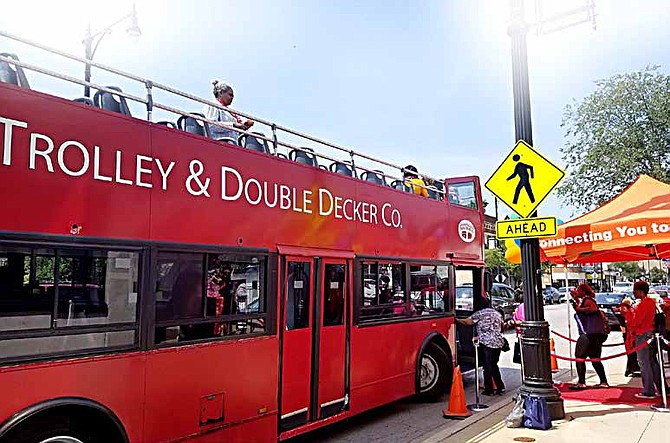 Carlos Nelson, who is the executive director for Greater Auburn-Gresham Development Corporation hosted the Auburn Gresham Housing Trolley Tour on Aug. 5, 2017. Photo Credit: Christopher Shuttlesworth