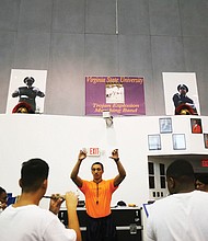 Drum major DeSean “Mr. B.” Bartholomeo, takes charge in rehearsal like he will on the football field during the Trojan Explosion performances.
