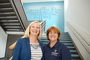 Faubion School Principal Jen McCalley and Concordia Dean of Education Sheryl Reinisch share one of the many spaces inside the new school which fosters and celebrates diversity and community. 