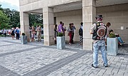 People line up outside the Virginia Historical Society for the Aug. 9 public hearing on the Confederate statues along Monument Avenue.
