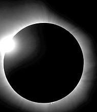 This photo captures the total solar eclipse in Indonesia
in 2016. It was provided by Bob Baer and Sarah Kovac, participants in the Citizen CATE Experiment. More than 200 volunteers with the National Science Foundation-funded project have been given small telescopes and tripods to observe the Aug. 21 eclipse from 68 locations across the United States. The images will be combined for a movie.