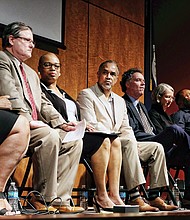 Commission members listen and take notes during the first public hearing Aug. 9. They are, from left, Kim Gray, Co-chair Gregg Kimball, Lauranett Lee, Stacy Burrs, Ed Ayers, Sarah Driggs, Julian Hayter and Coleen Butler Rodriguez. 