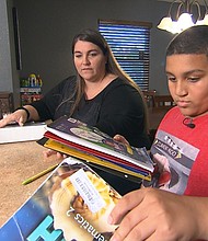 Meredith Stroud's son, LJ, was born with cleft lip and palate. He lost his Children's Medical Service coverage when he was 11./CNN
