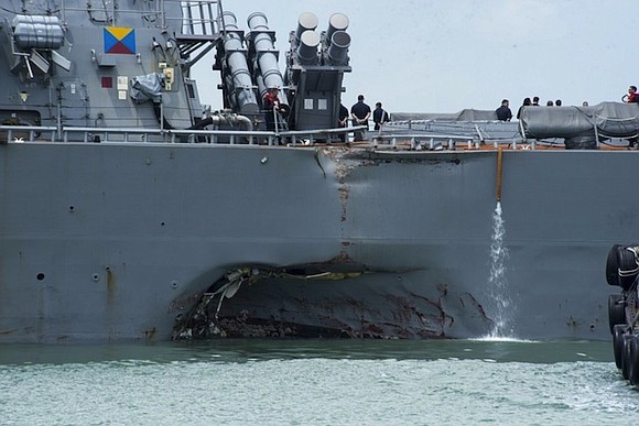 'Some remains" of 10 missing US sailors have been found after the collision between the US destroyer John S. McCain …