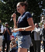 Shailene Woodley addresses a 2016 rally on the Dakota Access Pipeline outside court in Washington.