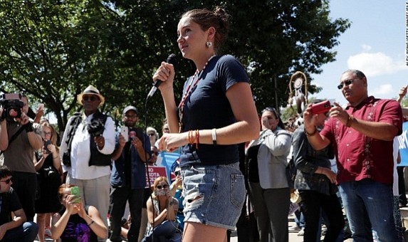 Shailene Woodley addresses a 2016 rally on the Dakota Access Pipeline outside court in Washington.