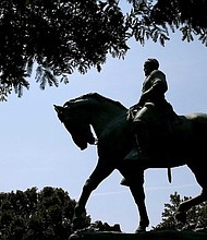 The statue of Confederate Gen. Robert E. Lee stands in the center of the newly renamed Emancipation Park in Charlottesville, Virginia.