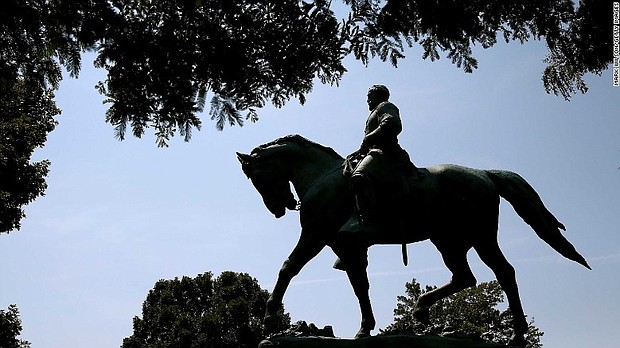 The statue of Confederate Gen. Robert E. Lee stands in the center of the newly renamed Emancipation Park in Charlottesville, Virginia.