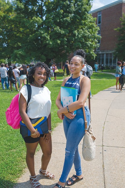 Virginia Union University, seniors Kevonia Jones, left, and Brandi Weaver-Searcy chat this week between classes. VUU students began moving in Aug. 7 for the start of classes on Tuesday, Aug. 15. 