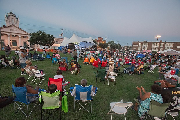 A ‘Down Home’ gathering // Hundreds of people sit back, enjoying the weather, the music and connecting with friends and relatives at the popular free event.