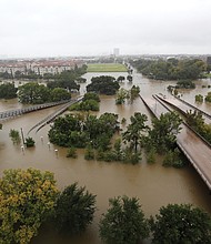 Hurricane Harvey pours over Texas // An overhead view of the flooding in Houston from Buffalo Bayou on Memorial Drive and Allen Parkway as heavy rain continues to fall on the city Monday.