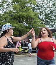 Carmen Santiago, left, and Veronica Estia. 