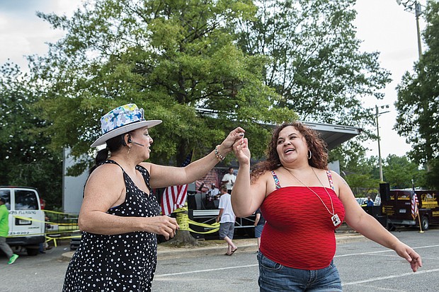 Carmen Santiago, left, and Veronica Estia. 