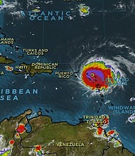 As Hurricane Irma's eye roars away from the tiny island of Barbuda and toward St. Martin, residents along its path scrambled to evacuate while stocking up on water, food and gas.