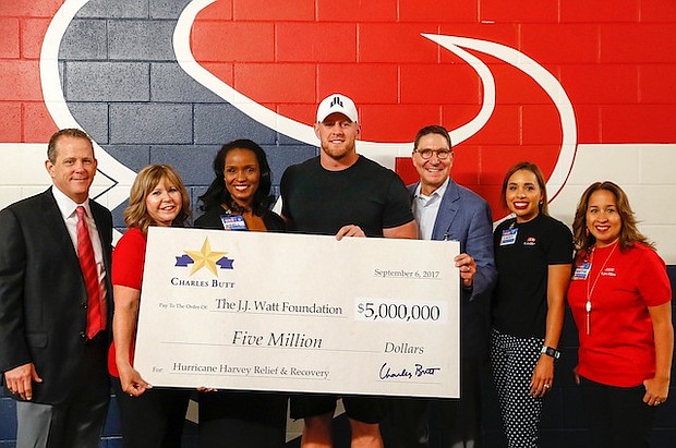 Scott McClelland, President, H-E-B Food & Drug, and Winell Herron, H-E-B Group Vice President Public Affairs, Diversity and Environmental Affairs, presented J.J. Watt with a $5 million check on behalf of Charles Butt at NRG Stadium on Wednesday, Sept. 6.  to benefit the Justin J. Watt Foundation’s Houston Flood Relief Fund.
 
Pictured (L-R): Jamey Rootes, Houston Texans President; Cyndy Garza-Roberts, H-E-B Public Affairs Director Houston Region; Winell Herron, H-E-B Group Vice President Public Affairs, Diversity;  Scott McClelland, President, H-E-B Food & Drug; Houston H-E-B Public Affairs team Lacey Dalcour Salas and Martha Barrera