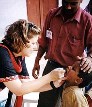 African American children are at a great risk of contracting infectious diseases like measles, due to not receiving full doses of
vaccines recommended by the Centers for Disease Control and Prevention (CDC). Photo Credit: Centers for Disease Control and
Prevention