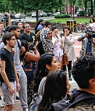 Students at Virginia Commonwealth University and their allies hold a rally Wednesday seeking continued university support for DACA students. VCU President Michael Rao pledged his support for the program and to keep Dreamers at the university. 