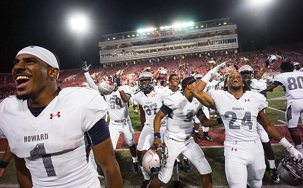 Howard University players celebrate their surprise 43-40 victory last Saturday over University of Nevada-Las Vegas at Sam Boyd Stadium in Las Vegas. 