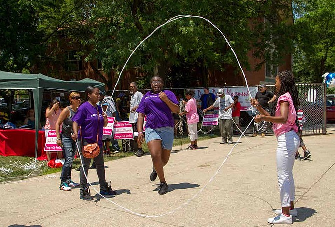 She-Ta Coulter, assistant for Mayor Annie R. Coulter of the Village of Ford Heights, explained that the annual Double Dutch Tournament is geared towards restoring generational bonding and resolving generational illnesses. Photo Credit: Double Dutch Movement